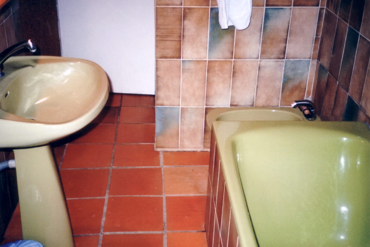 Bathroom vanity, mirror and chrome tapware polished to a streak-free shine